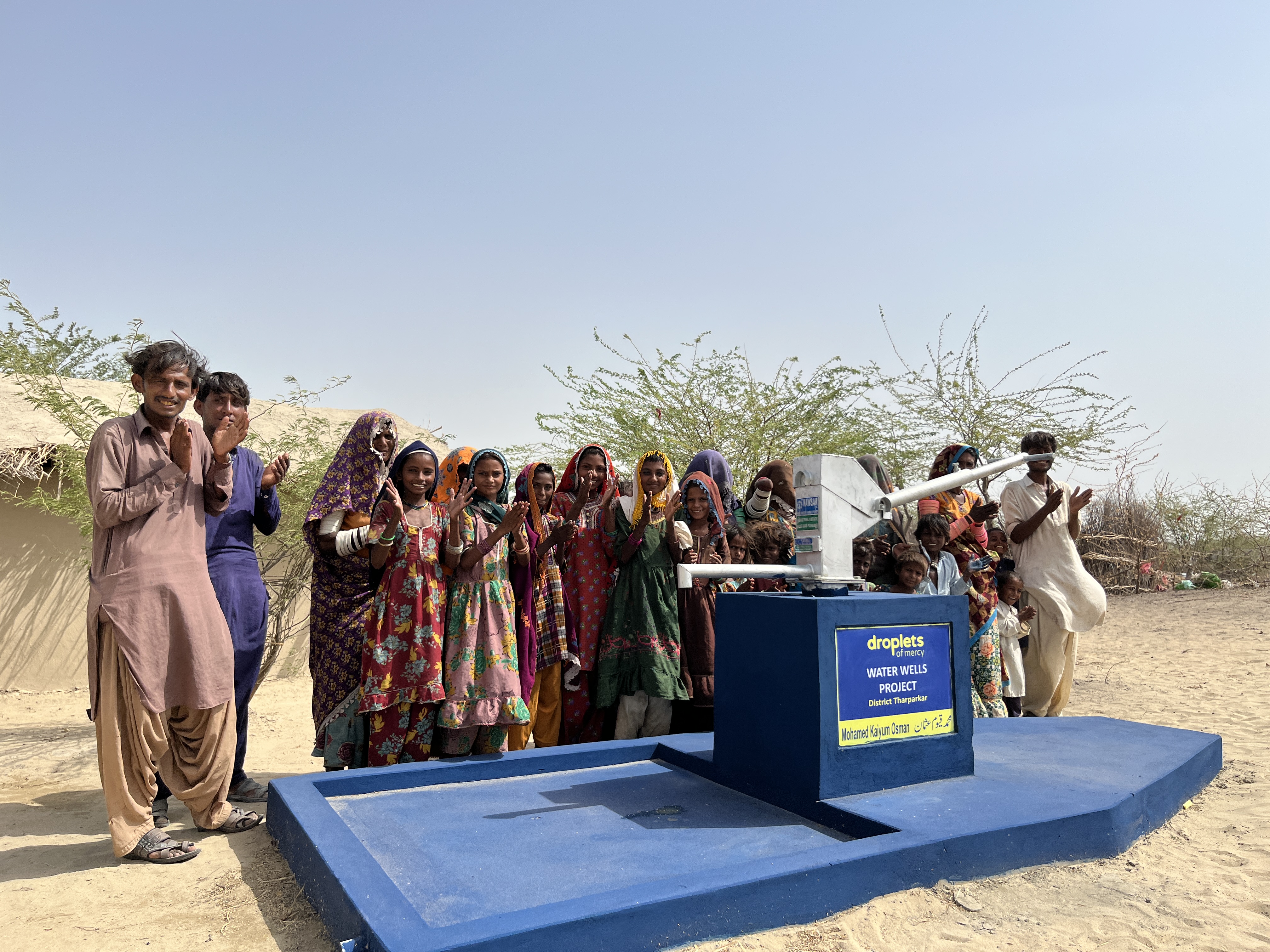 Community celebrating a clean water well
