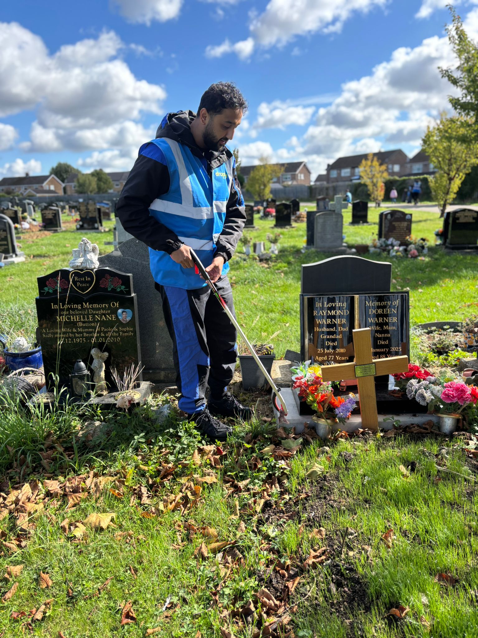 Droplets of Mercy volunteer carrying out a community clean-up
